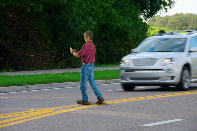 a man crossing the street