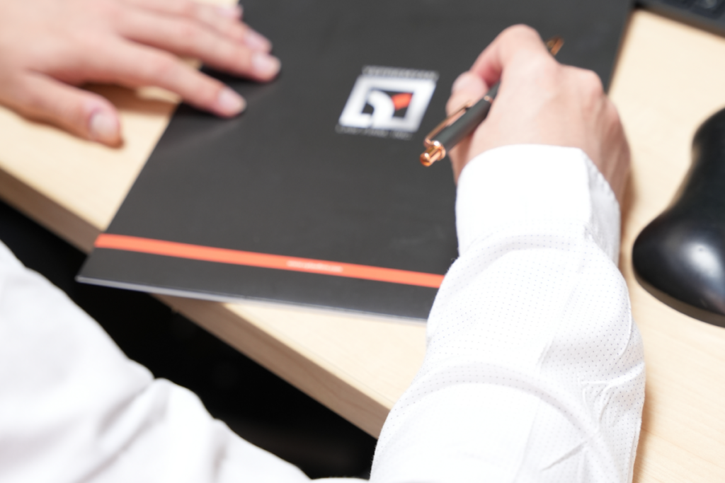 Person completing paperwork for a left-turn accident case evaluation