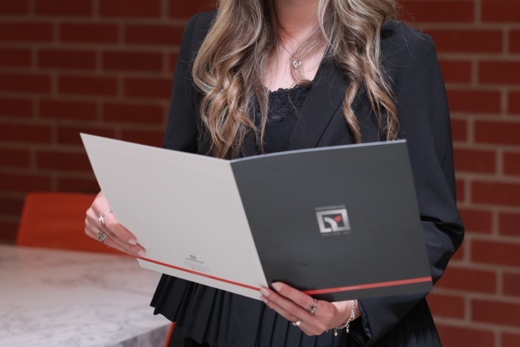 Personal injury case documents being reviewed by a law firm representative