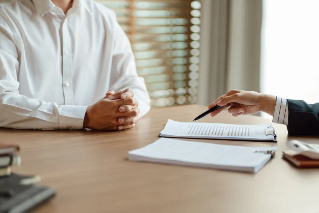 Reviewing legal documents with a client during a consultation